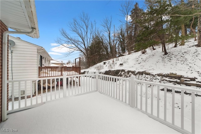 view of snow covered patio