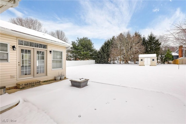 view of yard covered in snow