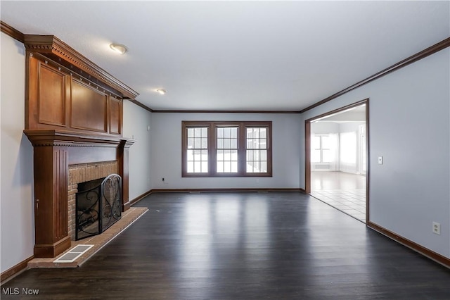 unfurnished living room with dark hardwood / wood-style floors and ornamental molding