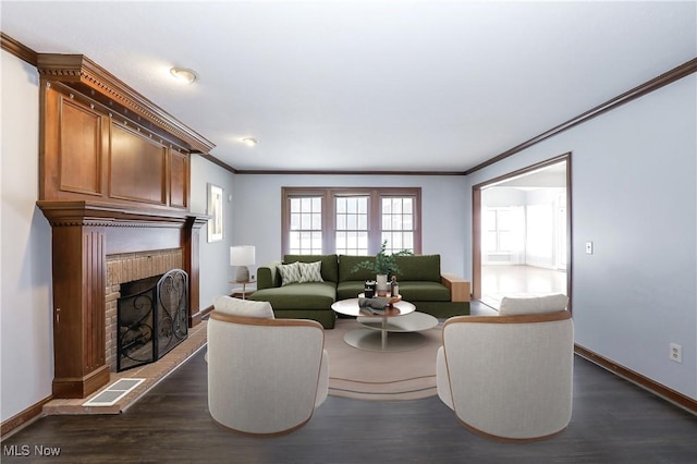 living room with dark hardwood / wood-style floors and ornamental molding