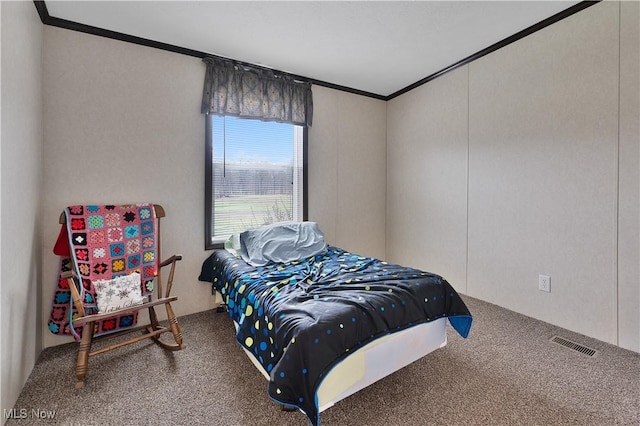 carpeted bedroom featuring ornamental molding