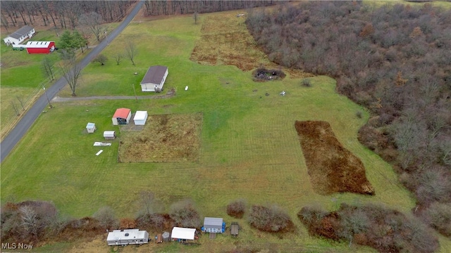 birds eye view of property featuring a rural view