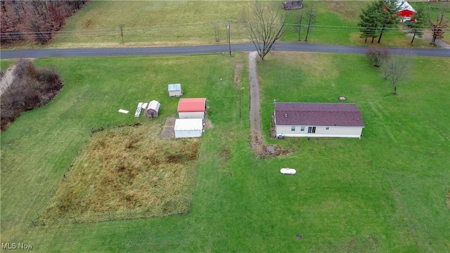 birds eye view of property featuring a rural view