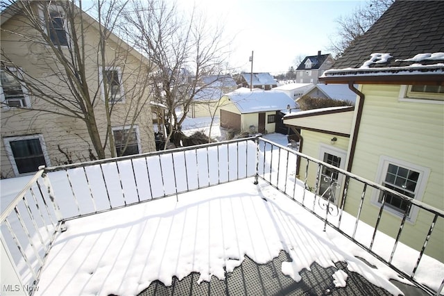 view of snow covered deck