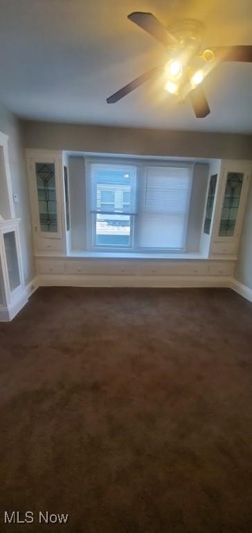 empty room featuring ceiling fan