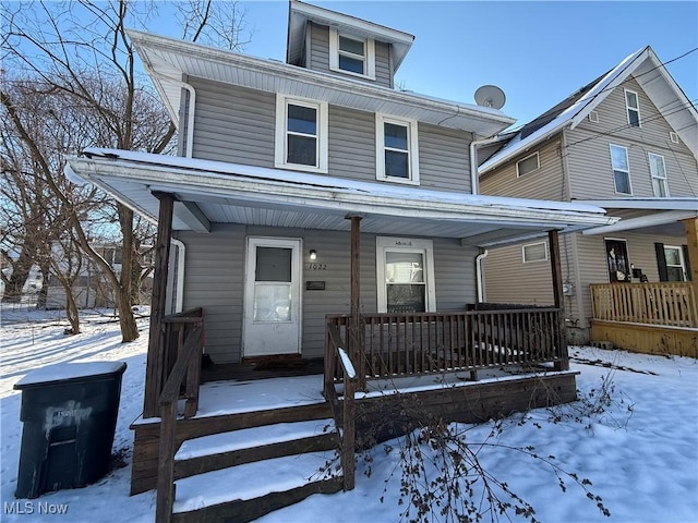 front facade featuring covered porch