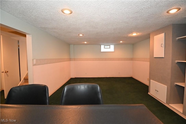 unfurnished office with a textured ceiling