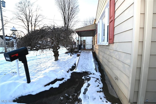 view of snow covered property