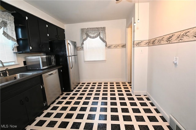 kitchen featuring sink and appliances with stainless steel finishes