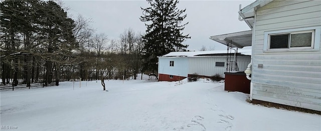 view of snowy yard