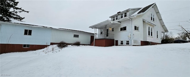 view of snow covered property