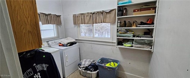 washroom featuring washer and dryer