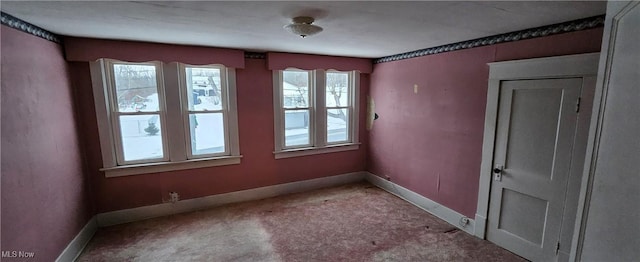 view of carpeted spare room