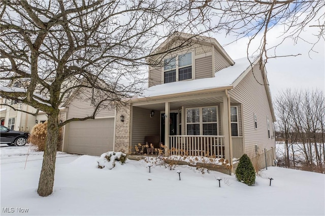 view of property featuring a porch and a garage