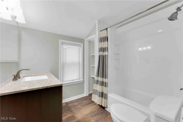 full bathroom featuring shower / bath combination with curtain, vanity, wood-type flooring, and toilet