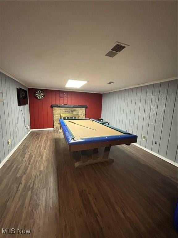 rec room featuring wooden walls, dark hardwood / wood-style floors, and pool table