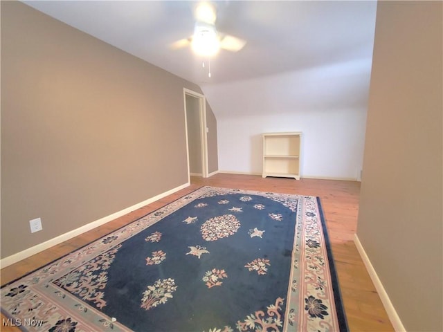 bonus room featuring ceiling fan, vaulted ceiling, and hardwood / wood-style flooring