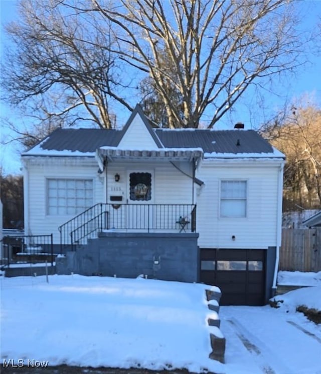 view of front facade with a carport