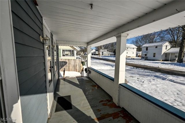 view of snow covered patio