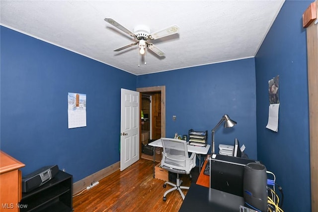 office area featuring ceiling fan, dark hardwood / wood-style flooring, and a textured ceiling