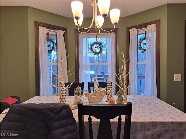 dining room with a chandelier