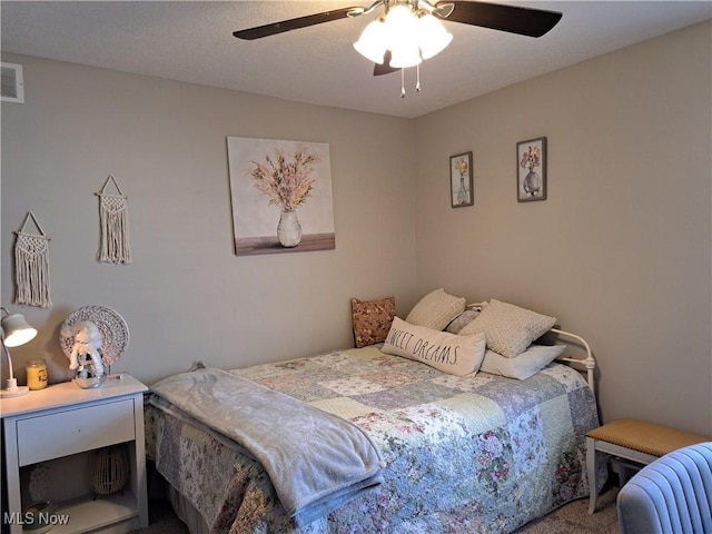 bedroom featuring ceiling fan