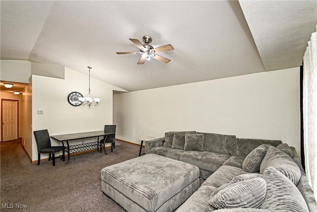 carpeted living room featuring ceiling fan with notable chandelier and lofted ceiling