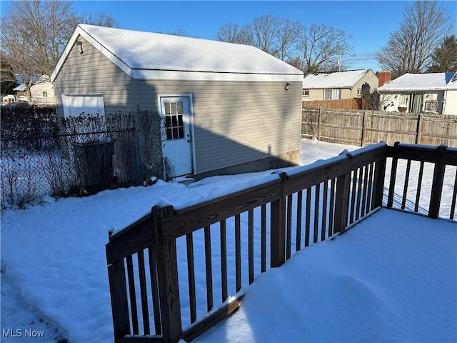 view of snow covered deck