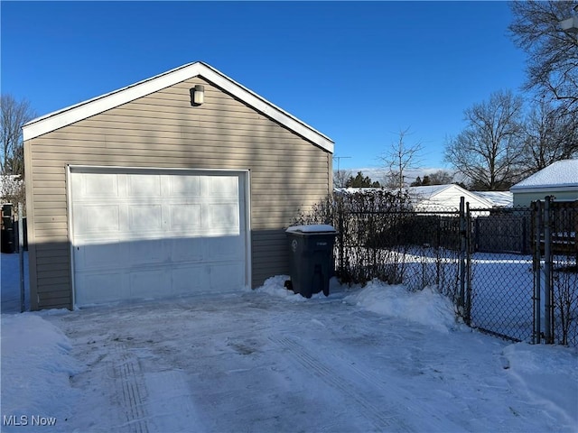 view of snow covered garage