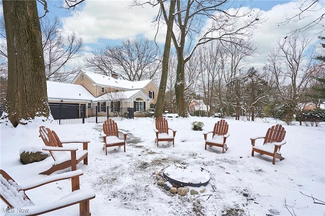 view of yard layered in snow