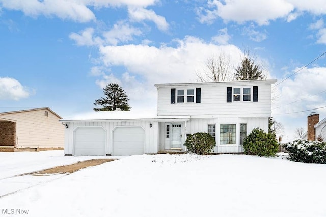 front facade with a garage