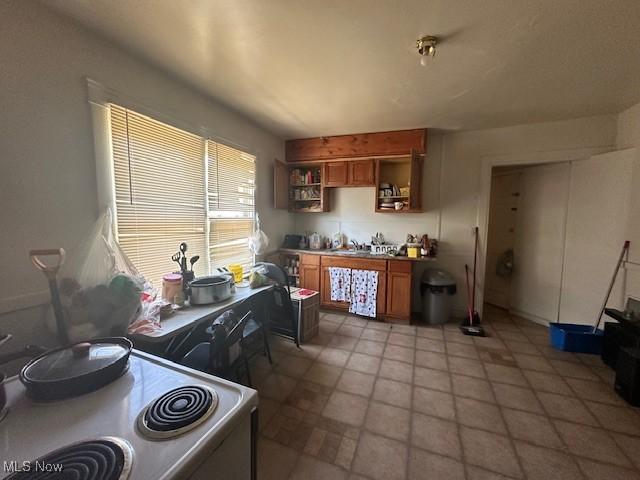 kitchen with range and sink