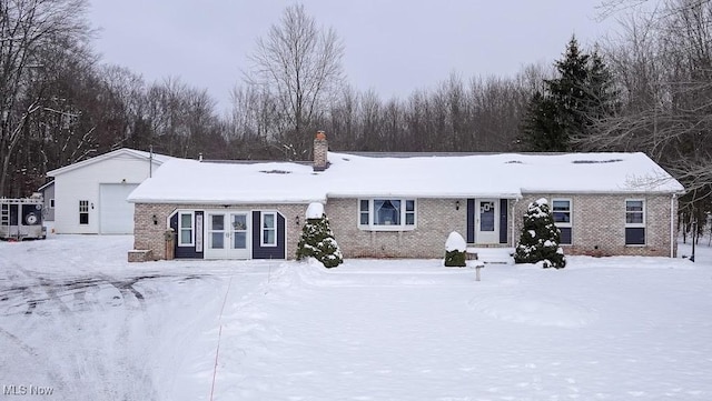 view of front of home featuring french doors and a garage