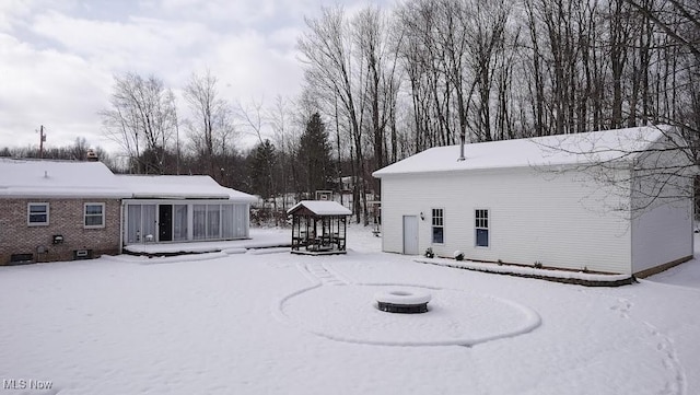 view of snow covered house