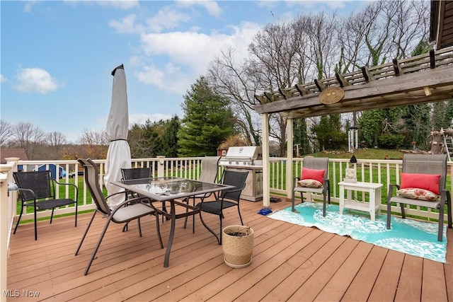 wooden terrace with a pergola and grilling area