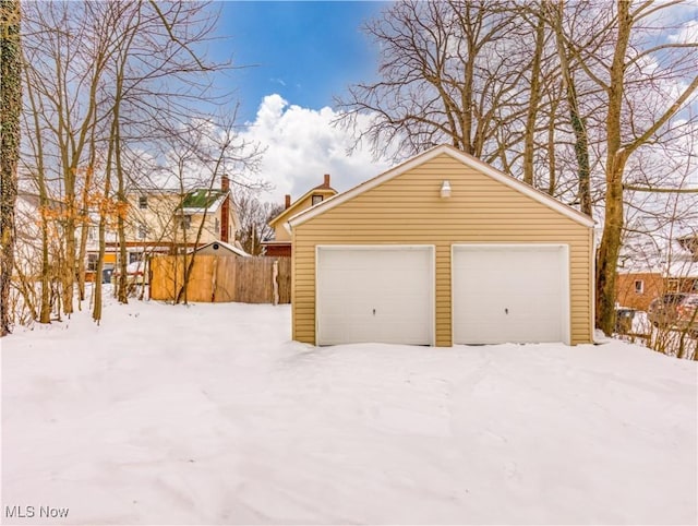 view of snow covered garage