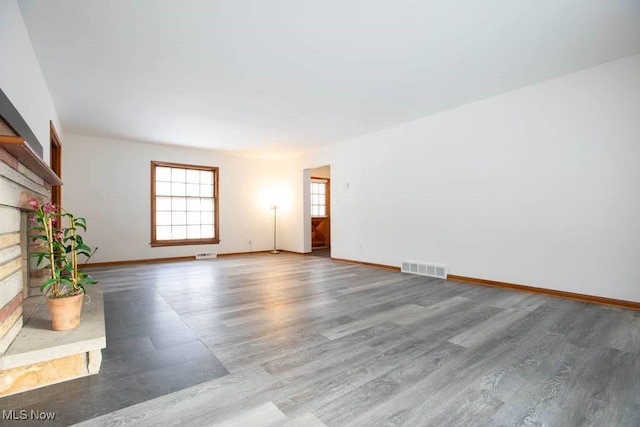 spare room with hardwood / wood-style flooring