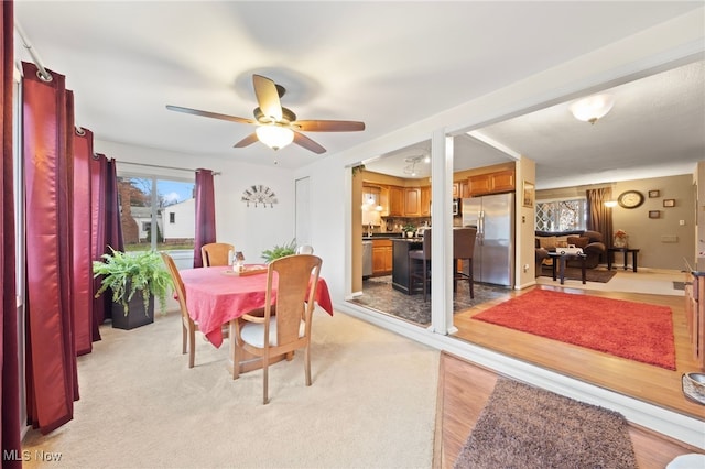 dining space featuring ceiling fan