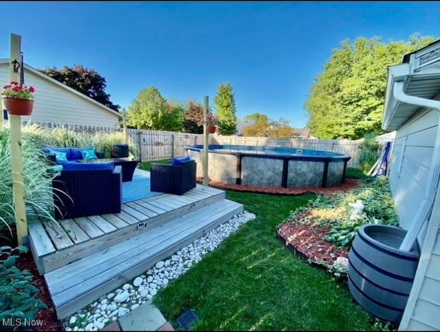 view of yard featuring a swimming pool side deck