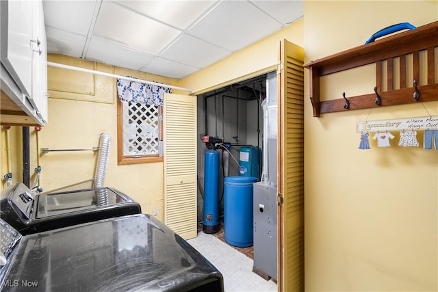 laundry area with separate washer and dryer