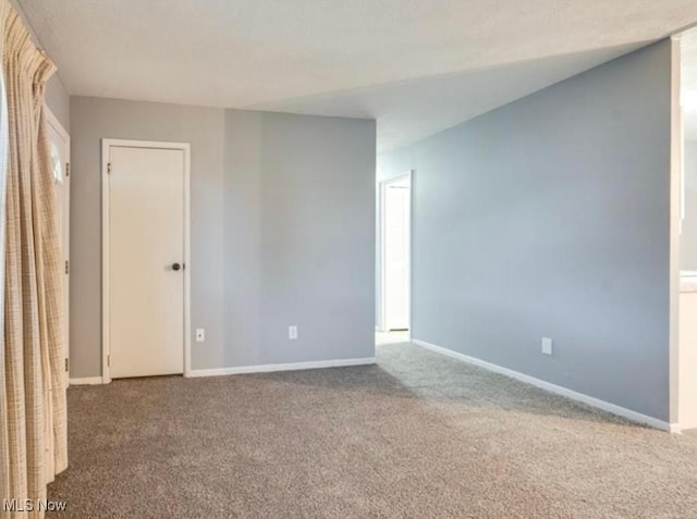 spare room with carpet flooring