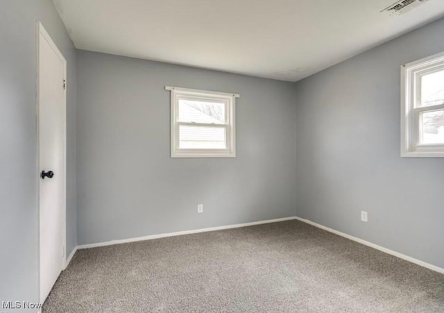 empty room with carpet floors