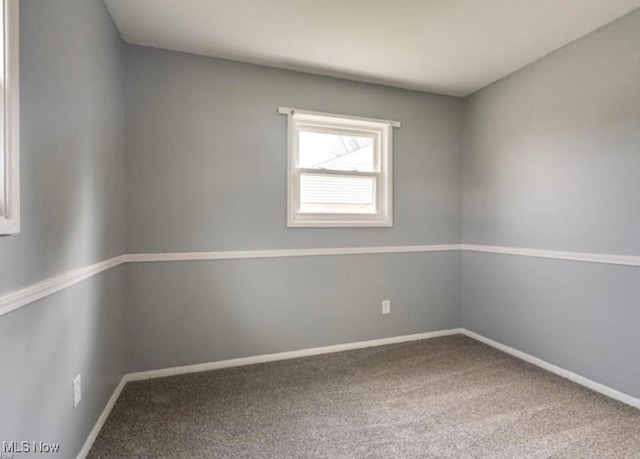 spare room with carpet flooring