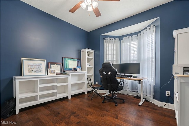 office with ceiling fan and dark hardwood / wood-style flooring