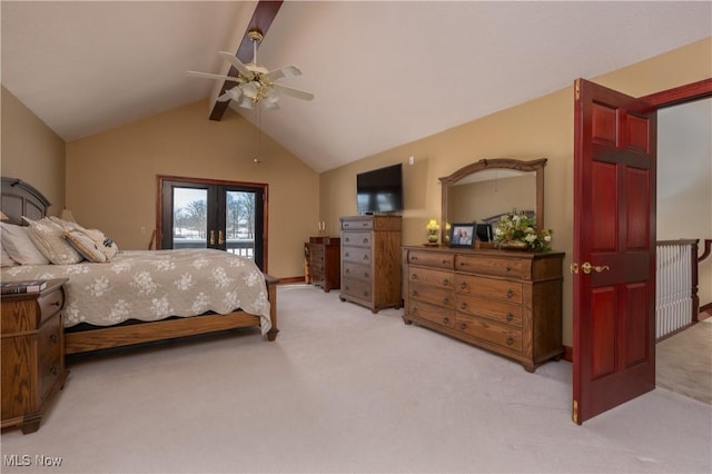 carpeted bedroom featuring vaulted ceiling with beams, ceiling fan, and french doors