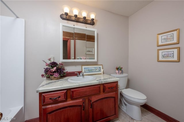 full bathroom featuring tile patterned floors, vanity, bathtub / shower combination, and toilet