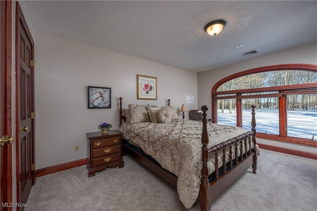 bedroom with light carpet