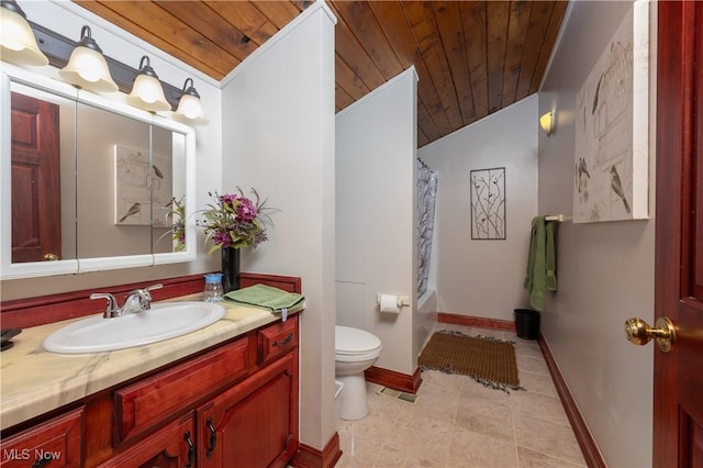 bathroom featuring vanity, wood ceiling, vaulted ceiling, and toilet