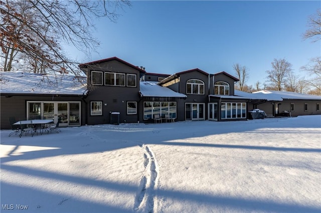 view of snow covered property