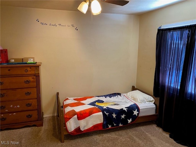 bedroom featuring carpet and ceiling fan